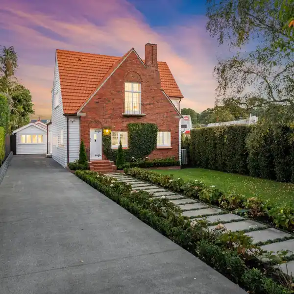 STYLISHLY RENOVATED ENGLISH BRICK HOME