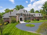 EXQUISITE HOME ON THREE ACRES IN THE HEART OF LADUE