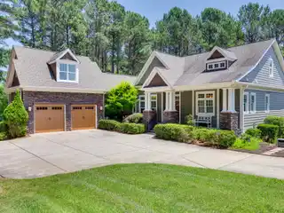 Refined Lakefront Living on Two Secluded Acres
