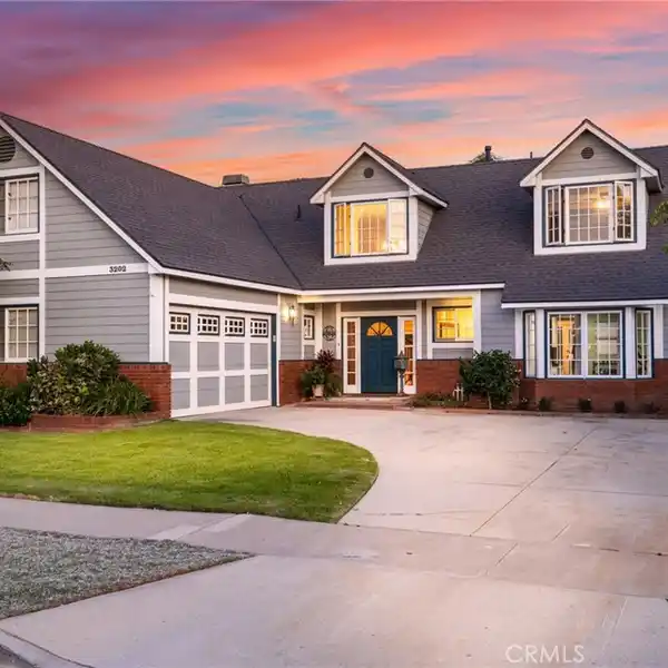 EXPANSIVE HOME IN A COVETED NEIGHBORHOOD
