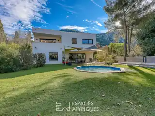 Contemporary Villa Nestled in a Green Setting