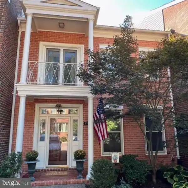 MAGNIFICENT BRICK TOWNHOUSE IN CARRIAGE HILL