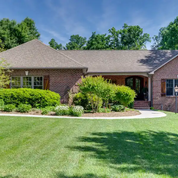 CUSTOM FULL BRICK RANCH HOME ON NEARLY TEN ACRES
