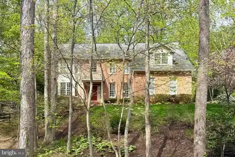 Grand Colonial on Private Hilltop Lot