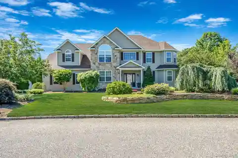 Updated Post-Modern Colonial in Country Manor Estates