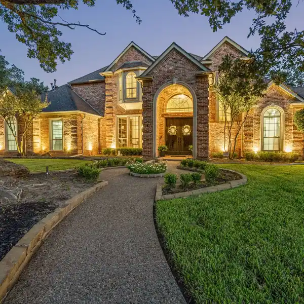 PRIVATE OASIS WITH FIVE-CAR GARAGE AND POND