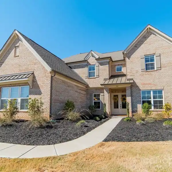 MODERN BRICK ESTATE ON EXPANSIVE WOODED ACREAGE