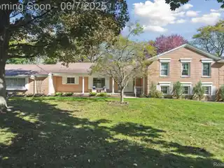 Beautifully Maintained Pond-front Home