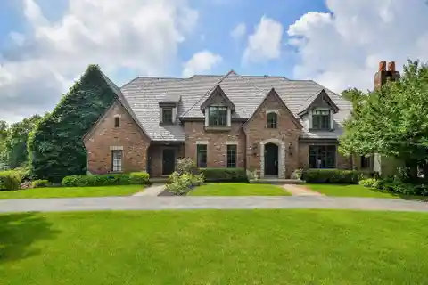 Stately All-Brick Home Framed by Circular Driveway