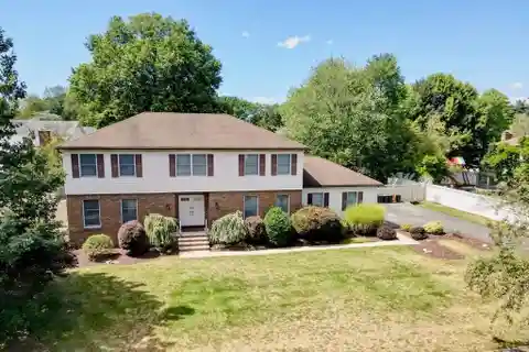 Black Oak Estates Gem with Four Bedrooms and Sunroom
