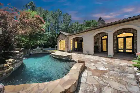 Stunning Spanish-Style Home with Private Theater and Custom-Designed Pool