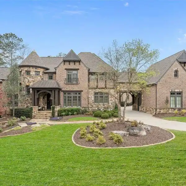 SPECTACULAR TWO-PLUS-ACRE ESTATE IN THE RIVER CLUB
