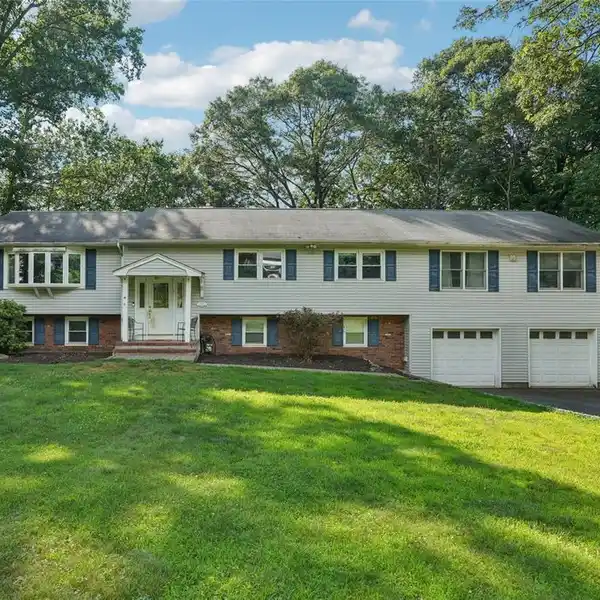 SPACIOUS AND EXPANDED RAISED RANCH