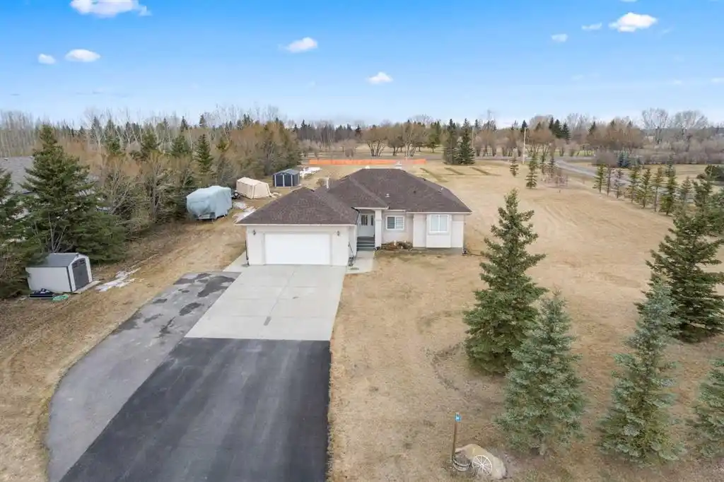 Acreage Living with Fairway Views and Town Convenience