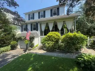 Sunny Colonial Retreat with Beautiful Blooming Gardens