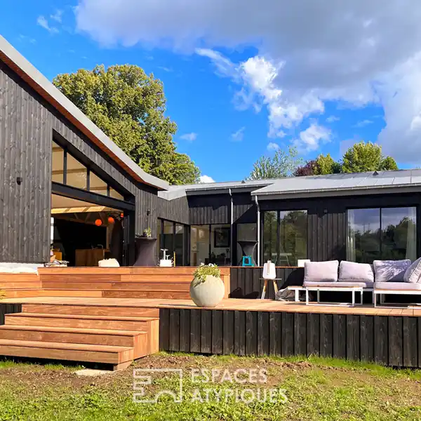 CONTEMPORARY RIVERSIDE HAVEN WITH ARCHITECTURAL ELEGANCE