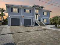 TURNKEY FURNISHED WATERFRONT POOL HOME