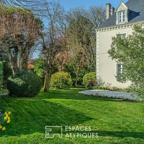 EXPANSIVE CHARACTER HOME ON LANDSCAPED GROUNDS
