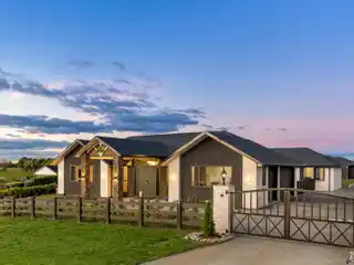 North-Facing Brick Estate with Triple Garage