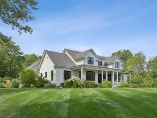 Exceptional Extended Cape Cod Style Home