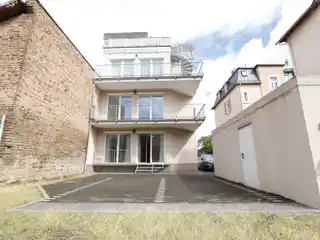 Centrally Located Three-Family House with Large Roof Terrace