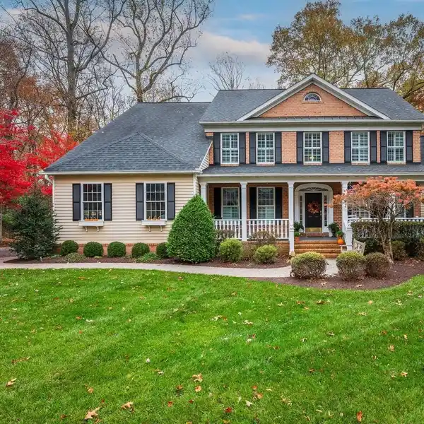 CUSTOM ELEGANCE SURROUNDED BY TRANQUIL WOODLAND VIEWS