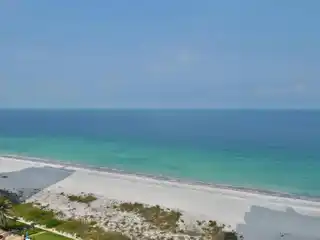 Turnkey Beachfront Condo with Designer Finishes