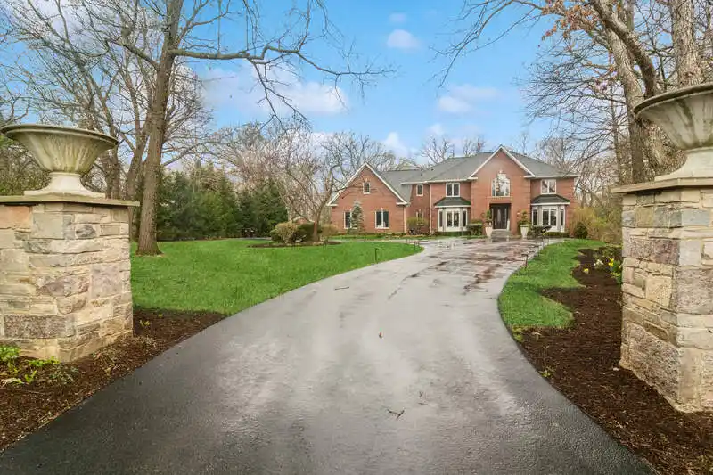 Professionally Renovated Home Nestled in Private Wooded Acres