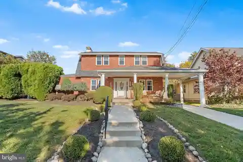 Exceptional Brick Home with Entertainer’s Dream Layout