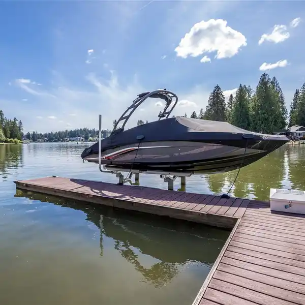 OPEN-CONCEPT STUNNER WITH SHARED DOCK AND LIFT ON LAKE TAPPS