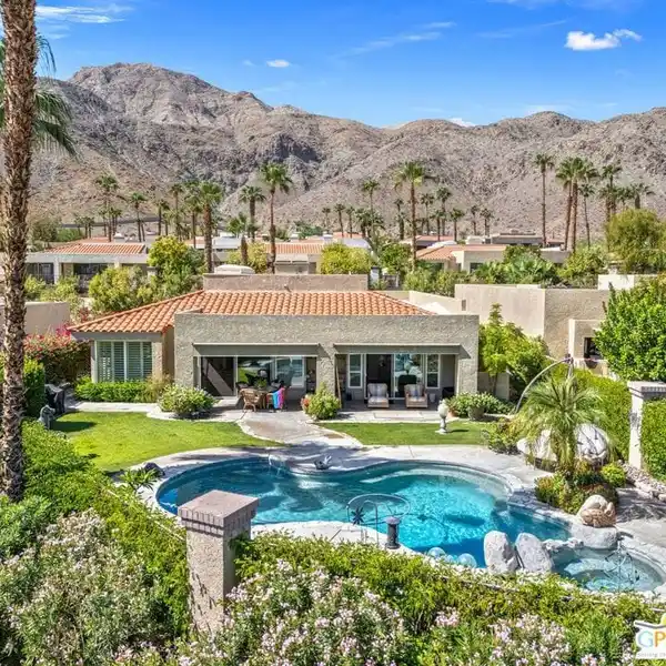 EXCLUSIVE VILLA STYLE HOME IN GATED NEIGHBORHOOD