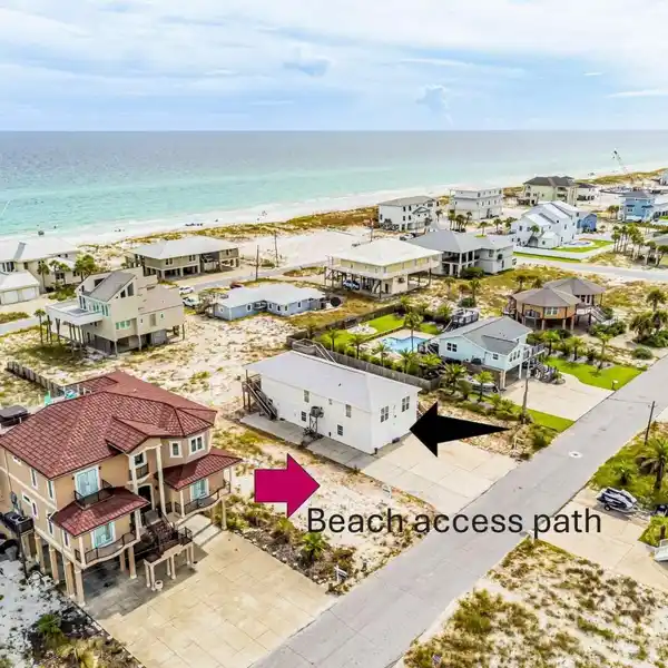UNIQUE THREE BEDROOM HOME STEPS TO THE BEACH