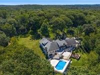 TRANSITIONAL STYLE MINI-ESTATE ON JUST UNDER FIVE ACRES