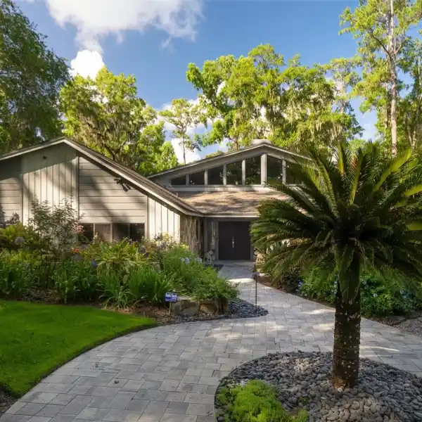 ARCHITECTURALLY DISTINCTIVE RESIDENCE ON OVER AN ACRE