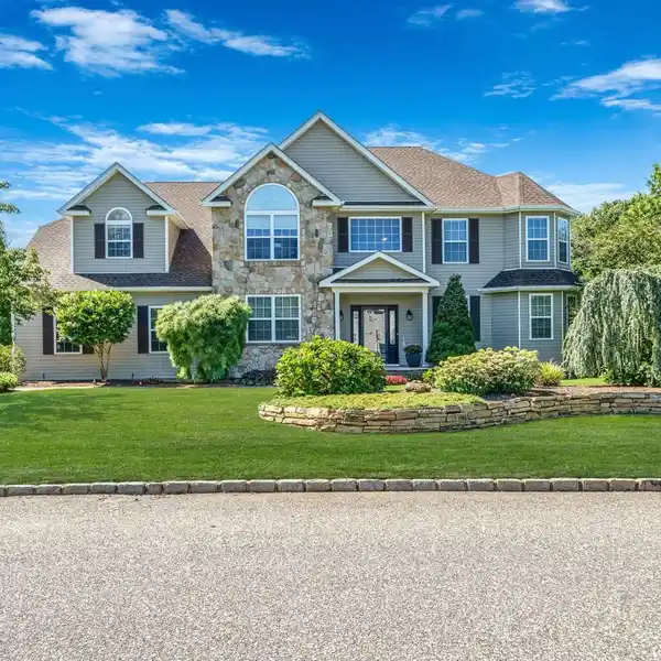 UPDATED POST-MODERN COLONIAL IN COUNTRY MANOR ESTATES