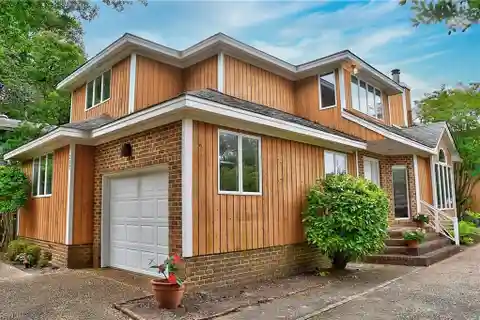 Vaulted Coastal Charm with Gleaming Interior Finishes