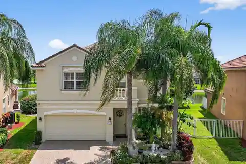 Central Boca Estate with Stunning Lake Views
