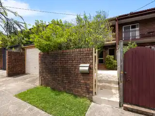 Stylish Double-Brick Family Home with Sun-Filled Courtyard