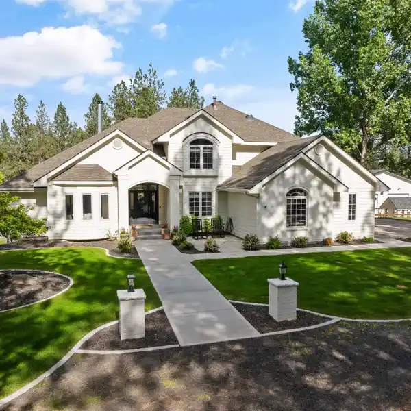 EXCEPTIONAL HOME ON FIVE WOODED ACRES