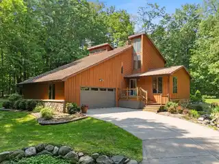 Meticulously Cared for Home on a Wooded Retreat
