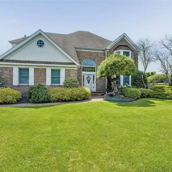 BEAUTIFULLY MAINTAINED COLONIAL-STYLE HOME