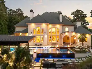 Luxurious Living on 2.5 Wooded Acres