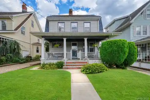 Charming Dutch Colonial Revival Home
