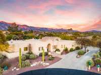 FIVE BEDROOM CUSTOM HOME IN GATED BELLAS CATALINAS