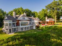 BREATHTAKING NILES ESTATE WITH SUBSTANTIAL ACREAGE AND WATER FRONTAGE