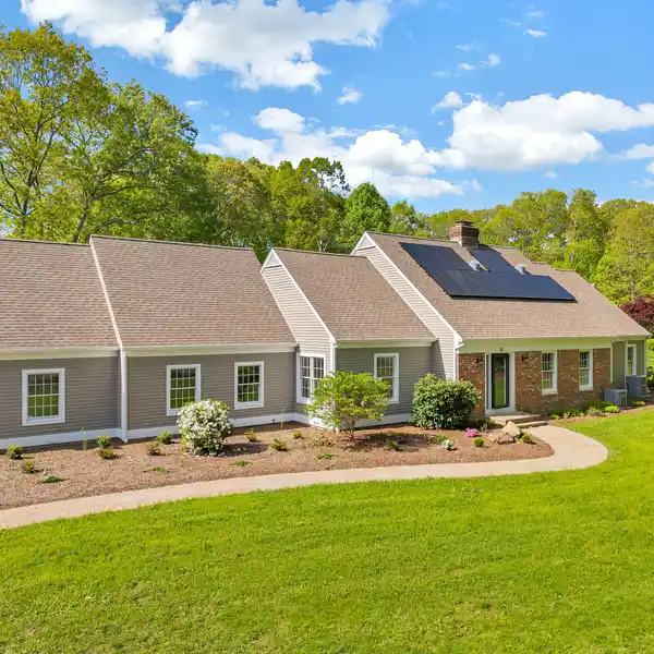 BRIGHT OPEN CONCEPT WITH SUN PORCH