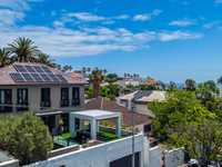 HIGH UP IN THE AVENUES WITH SEA AND MOUNTAIN VIEWS