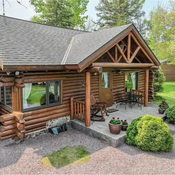 STUNNING SWEDISH LOG HOME ON LAKEFRONT