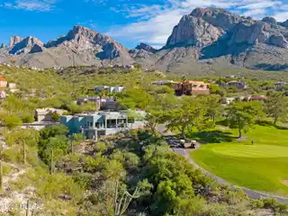 Modern Elegance Overlooking Fairways and Sunset Vistas