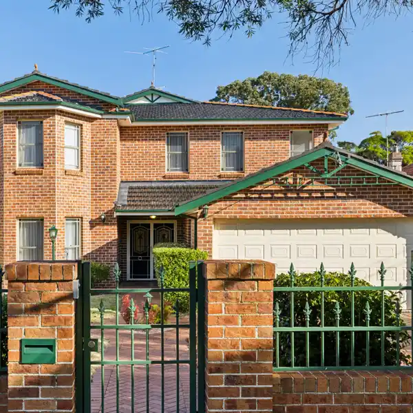 BEAUTIFULLY MAINTAINED BRICK RESIDENCE